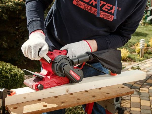 Ленточная шлифмашина Wortex SB 7611 E в кор. 1150 Вт, лента 76х533 мм, крепление к столу(120-380 м/мин, откидной носик)